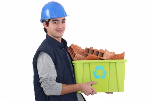 Professional home clearance team in Hendon removing items from a house